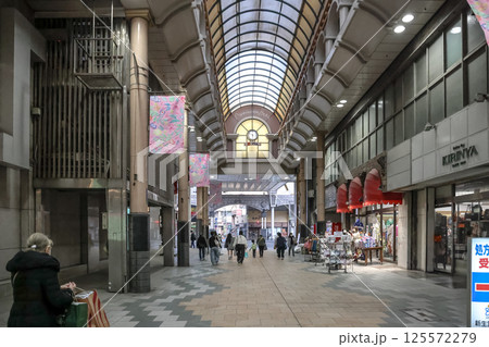 March 23 2025 March 23 2025 Urban Tram Passing Through Bustling Street Amid Vibrant City Shops March 23 2025 March 23 2025 Urban Tram Passing Through Bustling Street Amid Vibrant City Shops 125572279