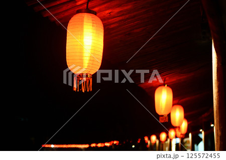 traditional Chinese style corridor, with traditional Chinese lanterns hanging under the eaves, Zhejiang Province, China 125572455