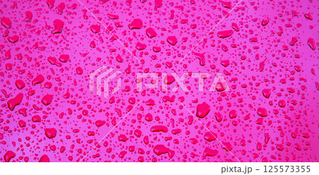 wide red purple background with texture of rain drops on metal surface closeup wide red purple background with texture of rain drops on metal surface closeup 125573355