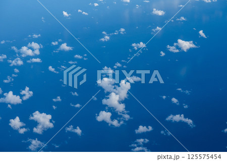 Aerial cloudscaspe picturesque clouds and sky from top view over the horizon Aerial cloudscaspe picturesque clouds and sky from top view over the horizon 125575454