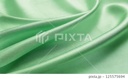 《AI画像》緑色のサテン生地 《AI画像》緑色のサテン生地 125575694