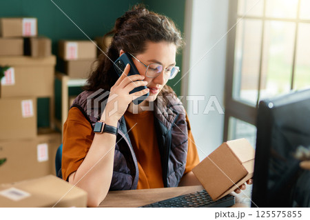 Woman working in a warehouse 125575855