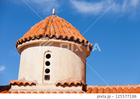 Detail of architecture church in Vathia town, Mani Greece. Detail of architecture church in Vathia town, Mani Greece. 125577186
