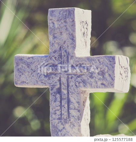 Greek stone cross on burial ground 125577188