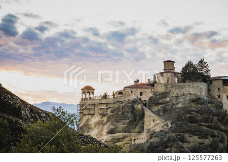 Sunset over Varlaam monastery in Meteora, Greece 125577263