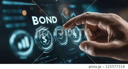 Hand pointing at digital bond screen with finance icons, blue light, trust, and data governance Hand pointing at digital bond screen with finance icons, blue light, trust, and data governance 125577318