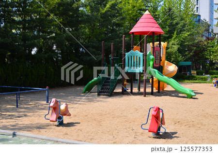 colorful playground in the park colorful playground in the park 125577353