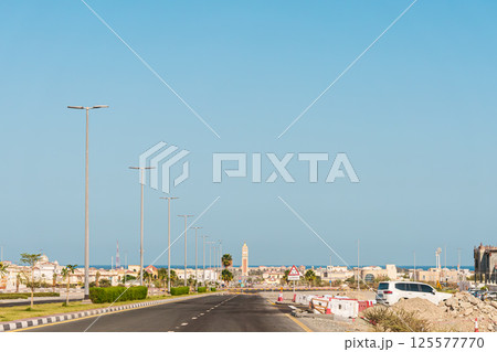 Deserted urban road 125577770