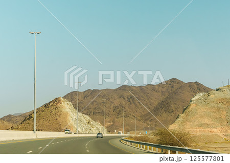 Highway desert mountains Highway desert mountains 125577801