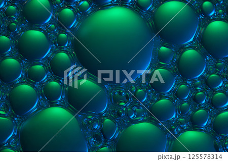 Collection of bubbles formed on the surface of liquid, sticking together to form the thick texture of essence. The gradient green light shines on the bubbles, creating a hazy color effect. 125578314