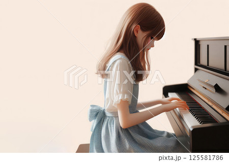A little girl playing the piano. Space for text. A little girl playing the piano. Space for text. 125581786