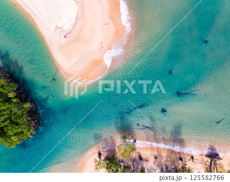 Aerial view of sandbar with sea water surface seascape background,Pink sand beach, Amazing summer background and holiday concept Aerial view of sandbar with sea water surface seascape background,Pink sand beach, Amazing summer background and holiday concept 125582766