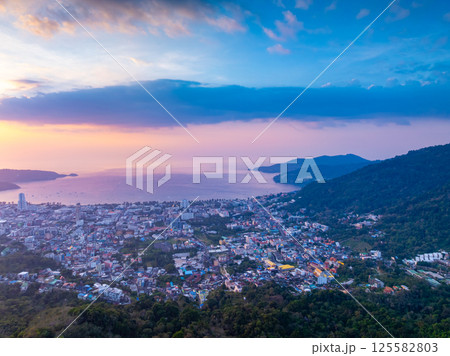Aerial view of beautiful sunset sky over sea at Patong bay Phuket city Thailand Aerial view of beautiful sunset sky over sea at Patong bay Phuket city Thailand 125582803