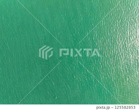 Aerial view beautiful sea surface nature background,Amazing waves texture ocean sea background Aerial view beautiful sea surface nature background,Amazing waves texture ocean sea background 125582853