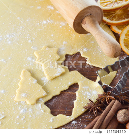 Christmas dough with baking ingredient Christmas dough with baking ingredient 125584350
