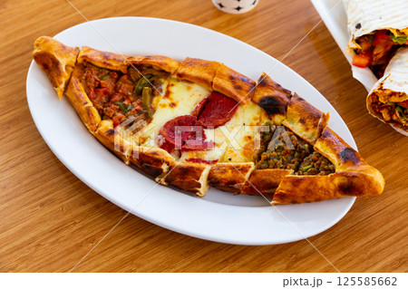 Turkish meat pide on plate. homemade food 125585662