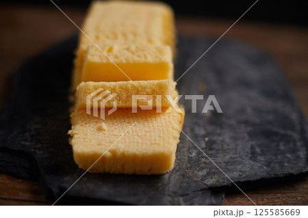 Slices of butter cake on plate 125585669