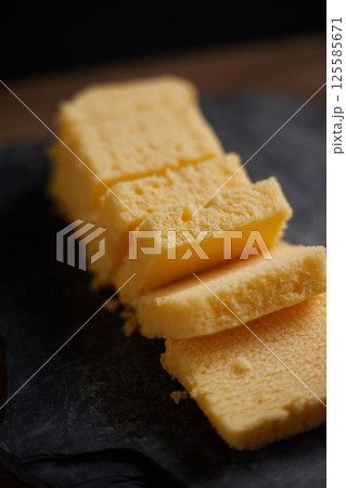 Slices of butter cake on plate 125585671