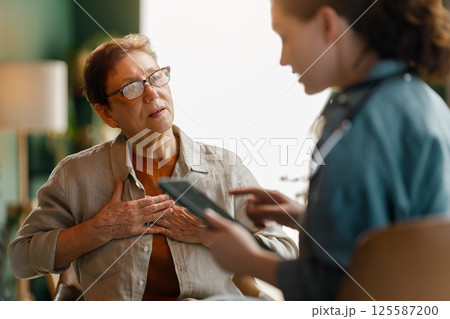 patient and a doctor talking patient and a doctor talking 125587200