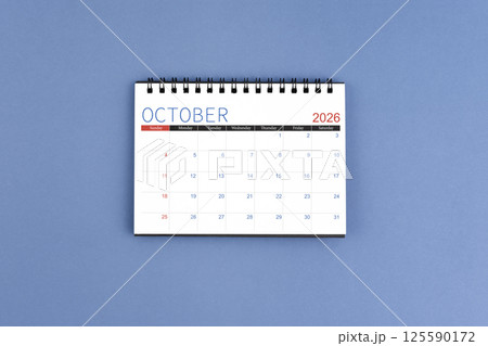 October 2026 Monthly desk calendar for 2026 year on blue color background. 125590172