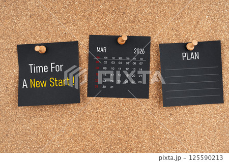 March 2026 calendar with Time for a new start and Plan text on black adhesive notes with wooden. March 2026 calendar with Time for a new start and Plan text on black adhesive notes with wooden. 125590213