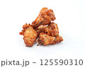 Crispy Golden Chicken Wings Isolated 125590310