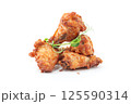Golden Fried Chicken Wings with Fresh Microgreens 125590314