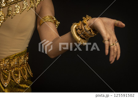 close detail of Khmer apsara performer of traditional dance in cambodia close detail of Khmer apsara performer of traditional dance in cambodia 125591502