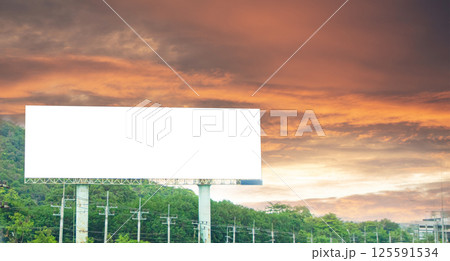 There are large billboards along the roadside. 125591534