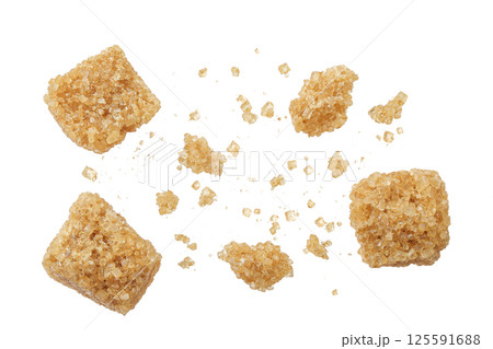 brown sugar cubes isolated on white background. Top view, flat lay brown sugar cubes isolated on white background. Top view, flat lay 125591688