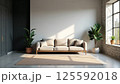 Scandinavian living room with beige sectional sofa and natural light 125592018