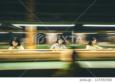 The asian women in a factory 125592560