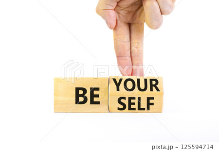 Motivational be yourself symbol. Concept words Be yourself on beautiful wooden block. Beautiful white background Businessman hand. Business motivational be yourself concept. Copy space. Motivational be yourself symbol. Concept words Be yourself on beautiful wooden block. Beautiful white background Businessman hand. Business motivational be yourself concept. Copy space. 125594714