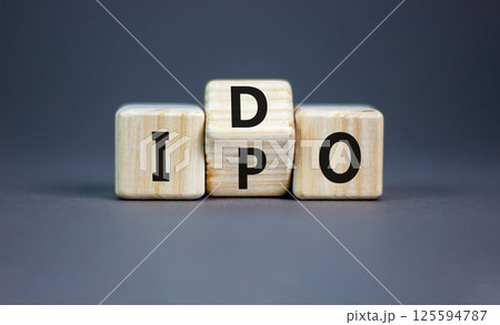 Initial public or DEX offering symbol. Concept words abbreviation IPO or IDO on wooden block. Beautiful grey table grey background. Business Initial public or DEX offering concept. Copy space. Initial public or DEX offering symbol. Concept words abbreviation IPO or IDO on wooden block. Beautiful grey table grey background. Business Initial public or DEX offering concept. Copy space. 125594787