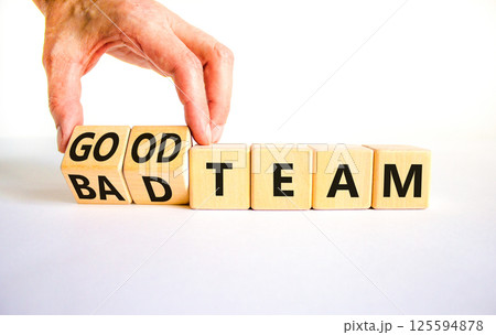 Good or bad team symbol. Concept words Good team Bad team on wooden cubes. Beautiful white table white background. Businessman hand. Business and good or bad team concept. Copy space. Good or bad team symbol. Concept words Good team Bad team on wooden cubes. Beautiful white table white background. Businessman hand. Business and good or bad team concept. Copy space. 125594878