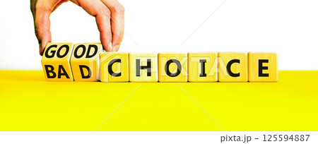 Good or bad choice symbol. Concept words Good choice or Bad choice on beautiful wooden blocks. Beautiful yellow table white background. Businessman hand. Business good bad choice concept. Copy space. Good or bad choice symbol. Concept words Good choice or Bad choice on beautiful wooden blocks. Beautiful yellow table white background. Businessman hand. Business good bad choice concept. Copy space. 125594887