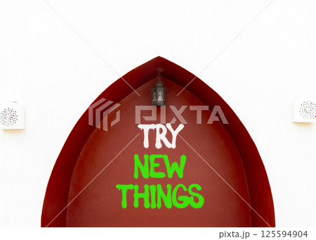 Try new things symbol. Concept words Try new things on beautiful white and red wall. Beautiful white and red wall background. Business motivational lifestyle try new things concept. Copy space. Try new things symbol. Concept words Try new things on beautiful white and red wall. Beautiful white and red wall background. Business motivational lifestyle try new things concept. Copy space. 125594904