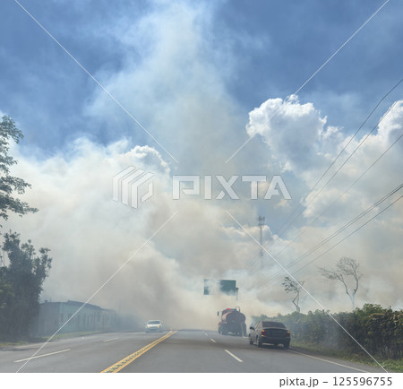Wildfire near highway road 125596755