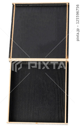 Open dark wooden box 125596756