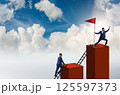 Businessman in career growth and progression concept 125597373