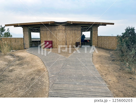 Bird watching house on the lake shore Bird watching house on the lake shore 125600203