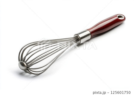Cooking tool featuring a metal whisk with a wooden handle for mixing ingredients in various recipes Cooking tool featuring a metal whisk with a wooden handle for mixing ingredients in various recipes 125601750