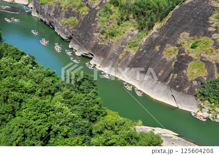 bamboo rafts drifting in rivers in Wuyi Mountain, Fujian Province, China 125604208