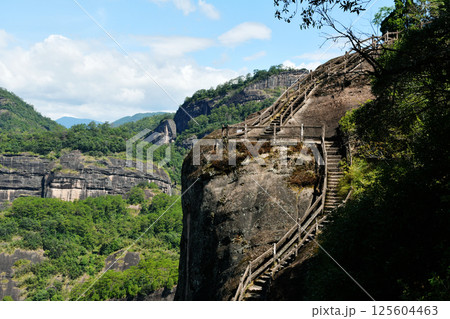 the steps on the rocks at the top of the mountain in Wuyi Mountain, Fujian Province, China 125604463