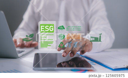 ESG environmental social governance investment business concept, Businessman using laptop to analyze ESG on screen in business investment strategy concept, Environmental and business growth together. 125605975