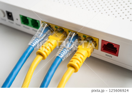 Ethernet cable with wireless router connect to internet service provider internet network. 125606924