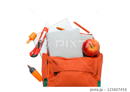 Bright orange backpack filled with books and school supplies, isolated on white 125607458