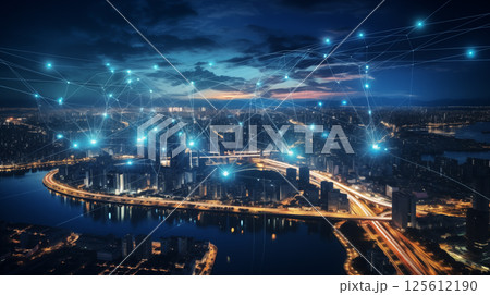 Futuristic smart city at night with glowing digital network overlay connected urban infrastructure concept 125612190