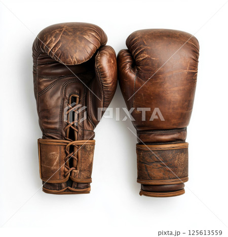 Old worn leather brown boxing gloves 125613559