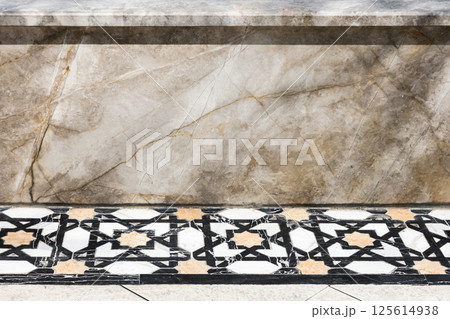 Close-up image showcasing a decorative marble wall and tiled floor 125614938